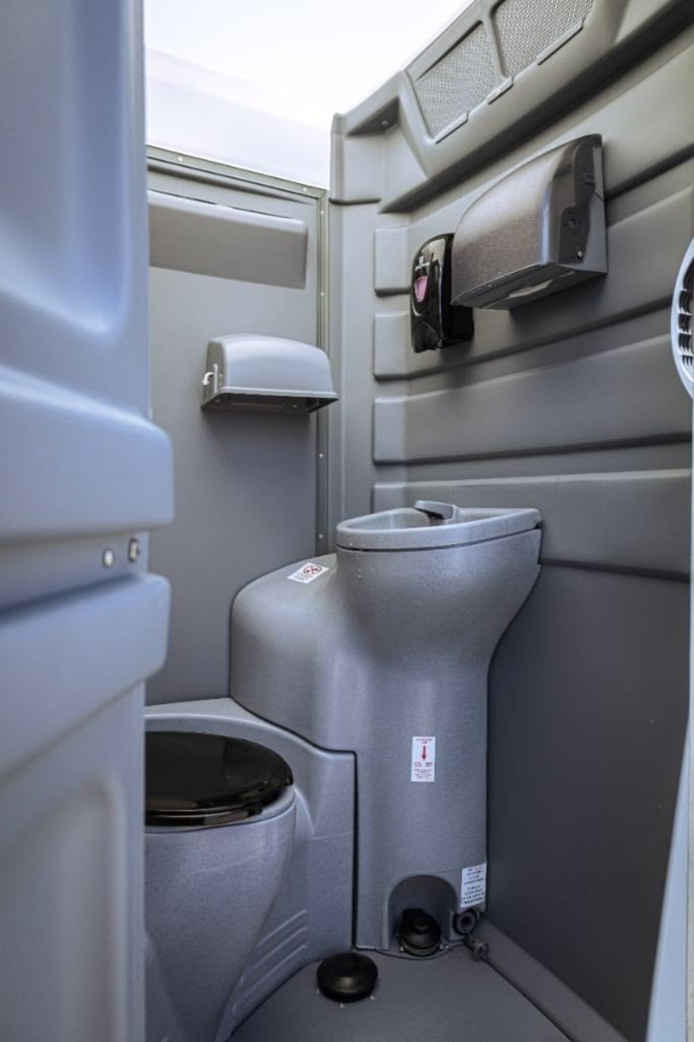 Interior view of a spacious ADA accessible portable restroom