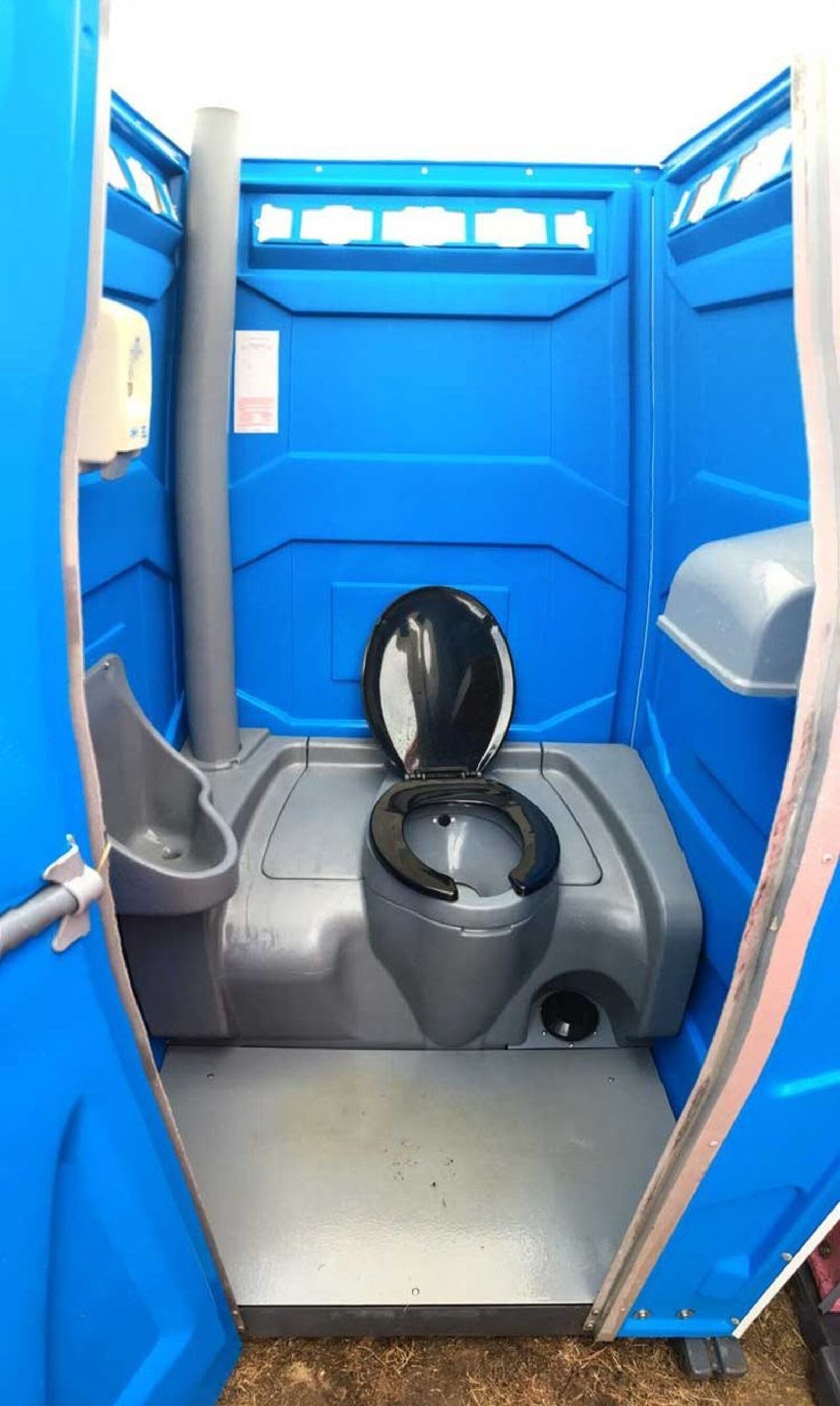 Portable toilet delivered and set up on a Clifton area job site